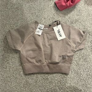 never worn AYBL workout top!!! size SMALL